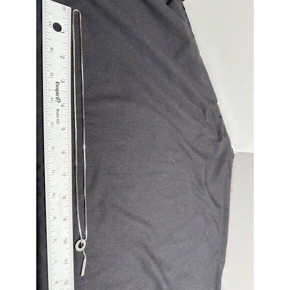 Elegant Silver Tone Lariat Love Knot Necklace With Crystal Accents - Picture 6 of 7